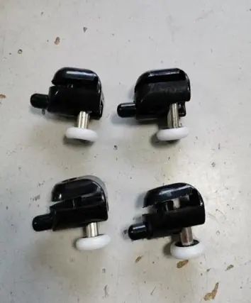 Affaire À Saisir Roulettes double corps noires pour portes de douche diamètre 20mm - AURLANE